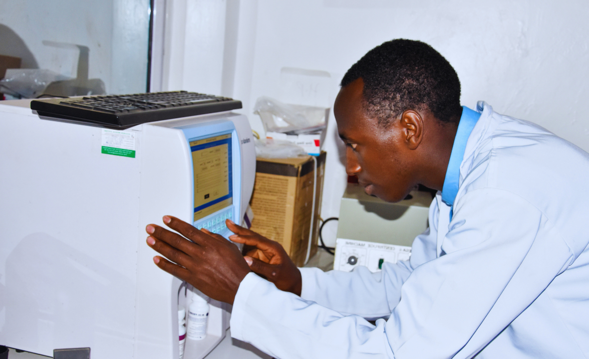 Laboratory student using diagnostic equipment